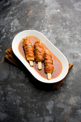 Soya Chaap Curry served in a bowl. Healthy recipe popular in India and Pakistan