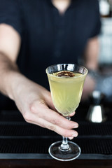 Bartender making cocktails in a restaurant