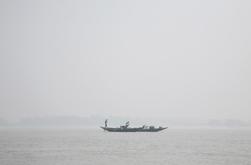 Misty morning on the holiest of rivers in India. Ganges delta in Sundarbans, West Bengal, India 