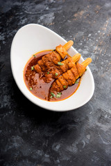 Soya Chaap Curry served in a bowl. Healthy recipe popular in India and Pakistan