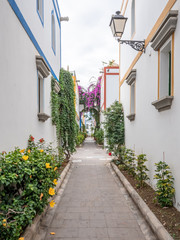 Fototapeta na wymiar The colourful alleyways and fisherman's villages in the old district of Puerto de Mogan on the south coast of the Canary Island of Gran Canaria.