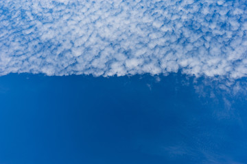 Beautiful white clouds with blue sky background.