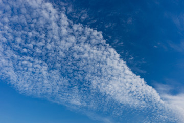 Beautiful white clouds with blue sky background.
