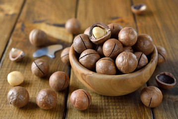 Macadamia nuts in a wooden bowl