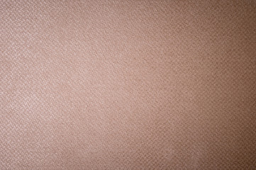 Textured background surface of textile upholstery furniture close-up. burlap beige color fabric structure