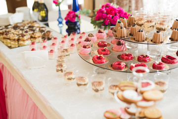 Different kinds of baked sweets on a buffet