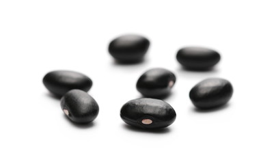 Organic black beans isolated on white background