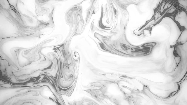 Abstract paint ink in motion. Psychedelic background footage. Moving black and white spots.