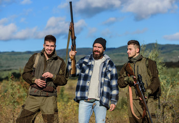 Poacher partner in crime. Activity for real men concept. Hunters gamekeepers looking for animal or...