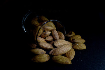 healthy almond in a small glass