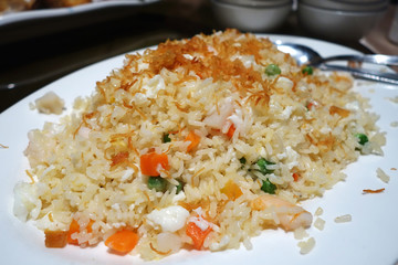 Chinese fried rice on white plate