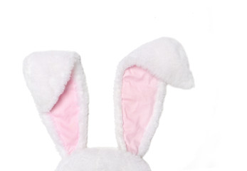White and pink rabbit ears on white background. The concept of Easter