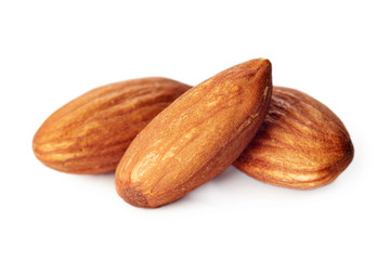 Close up of almonds kernel isolated on white background
