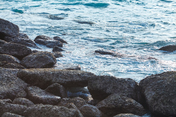 water at the coast rocks on an  island of Thailand