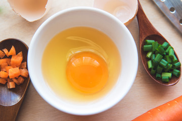separated egg white with Scallion and carrot