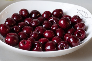 red cherries in a bowl