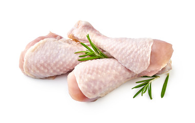 Raw chicken legs with rosemary isolated on white background