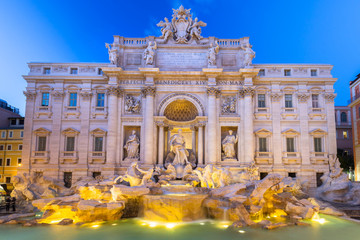 Beautiful architecture of the Trevi Fountain in Rome at dusk, Italy