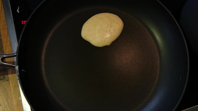 American pancake batter is poured into a pan