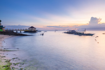 Obraz premium Sunset view of the Moalboal beach, Cebu, Philippines
