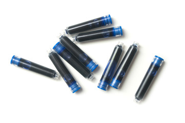 group of plastic cartridge of ink on white background