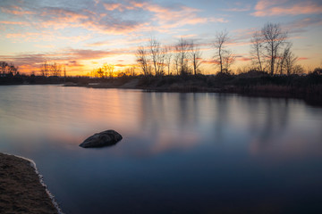 Sunset over the pond in Puchaly, Raszyn, Poland