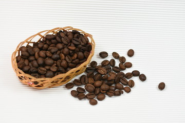 coffee beans in a small wicker basket