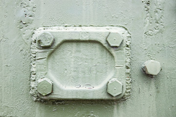 Military steel bodywork, green armored vehicle, rivets, bolts, detail, army industry