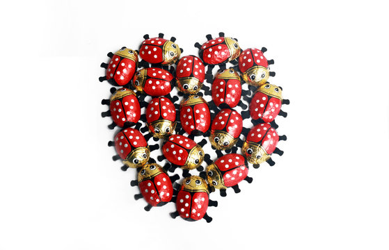 chocolate ladybugs forming a heart