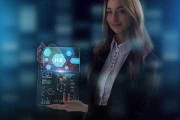 The concept of business, technology, the Internet and the network. A young entrepreneur working on a virtual screen of the future and sees the inscription: HR