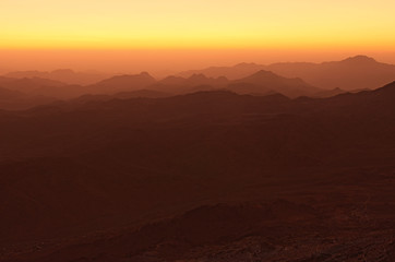Panoramic landscape view of Mount Sinai (Mount Horeb, Gabal Musa, Moses Mount) during sunrise. Sinai Peninsula of Egypt. Pilgrimage place and famous touristic destination