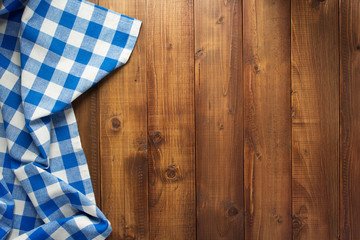 checked cloth napkin at wooden table