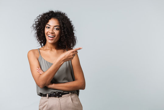 Happy young african woman casualy dressed standing