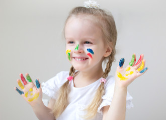 Caucasian Little Girl Painting with Colorful Hands Paints at Home Early Education Preparing for...