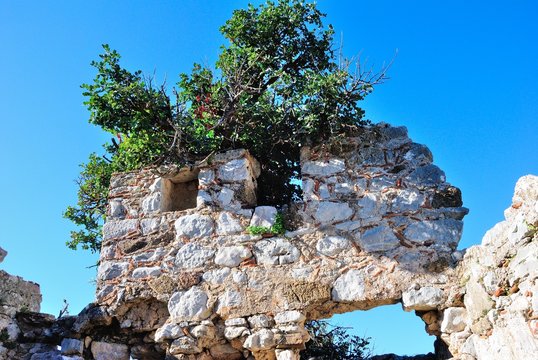 Ruins of an ancient Hydas castle on the Sarıkaya Hill above Selimiye village near Marmaris resort town in Mugla Province of Turkey
