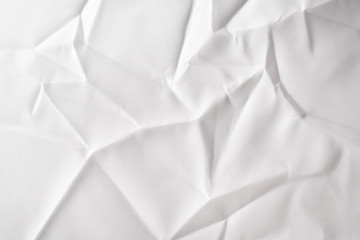 Texture of paper with kinks and dents, old and dilapidated. white crumpled fabric