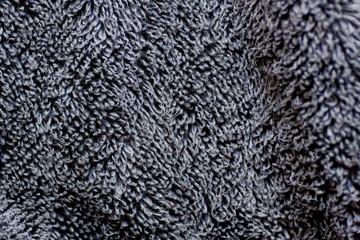 Texture black and grey shaggy fibers macro detail of fabric