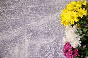 Colorful flowers on grey background.Bouquet of flowers. 