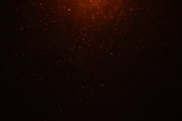 Black background with falling snow. Moon light in winter night. 