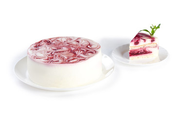 raspberry cream cake on white plate on white background