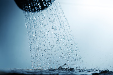 Fototapeta na wymiar Shower head and water drops.