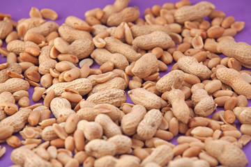 peanuts on a purple background