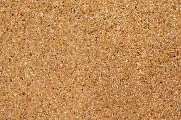 Exposed aggregate finish. Washed sand. Texture and background.