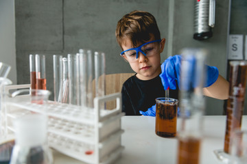 Preschooler scientist in laboratory