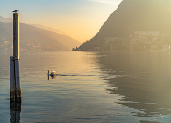 Sunset over the hills and and lake of Lugano, Switzerland