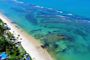 Aerial view of a paradise sea with clear water. Fantastic landscape. Great beach view. Arraia...