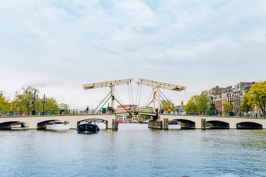 Amsterdam, Netherlands September 5, 2017: Magere Brug Bridge and Amstel river.