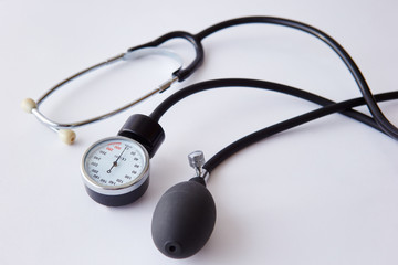 Mechanical tonometer on a white background, close-up