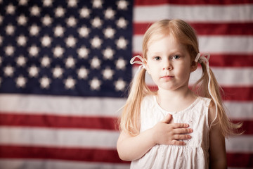 Little Girl Honoring American Flag