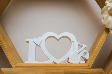 Obraz na płótnie Canvas Wooden background with an inscription love. Love text sign. wooden texture. Love concept